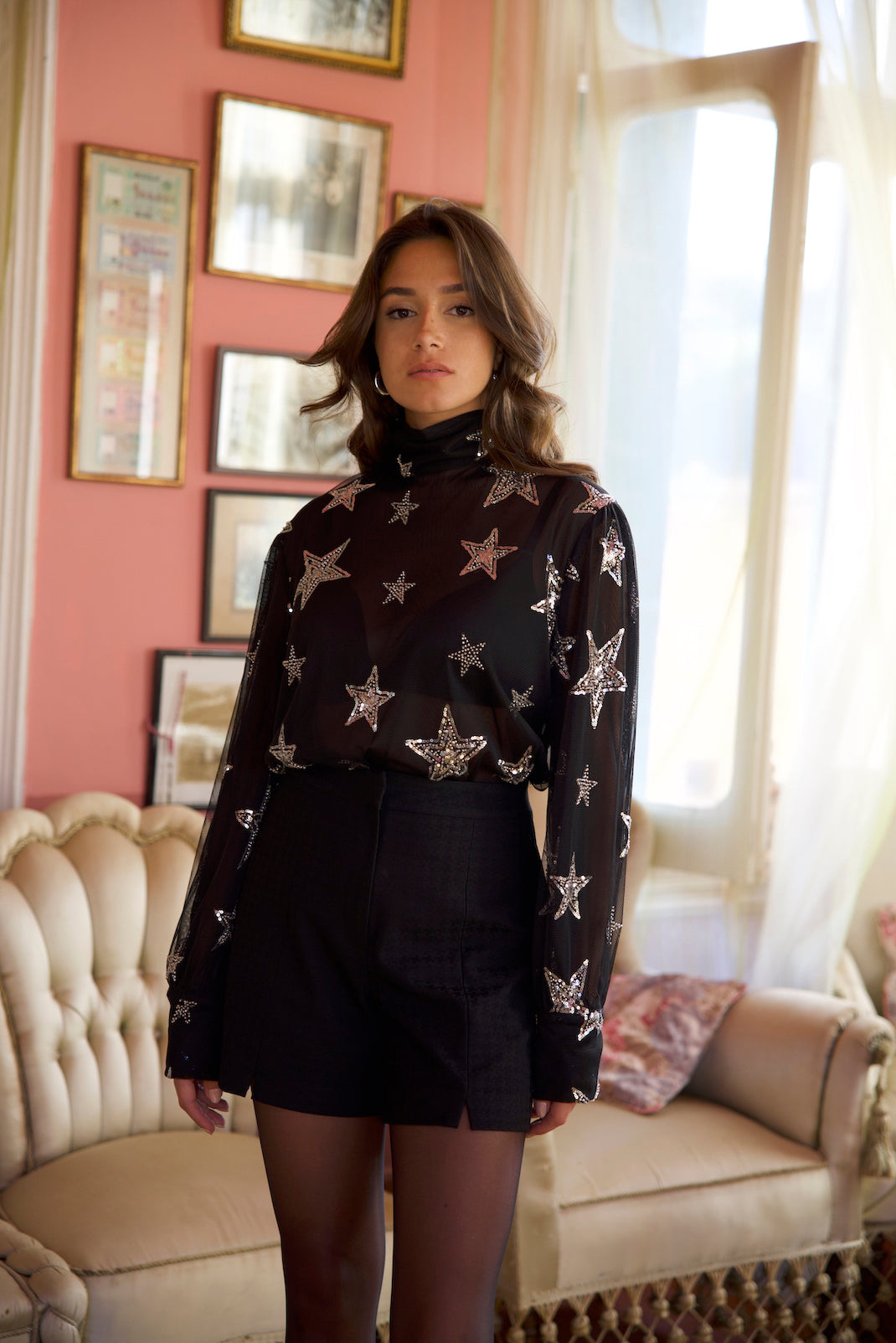 Elegant sheer tulle top with star sequins and high neckline for evening wear